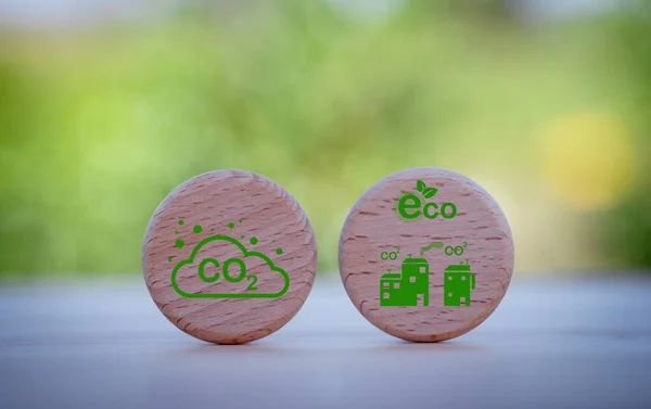 environment Earth concept. Net zero greenhouse gas emissions target. Climate neutral long term strategy. wooden cubes with decarbonization icon and green icon. Green banner.