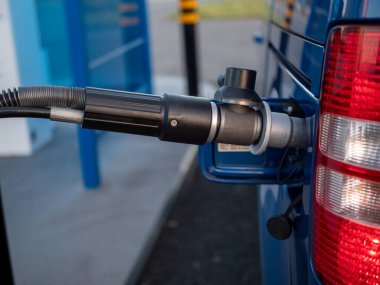  a gas nozzle of a compressed natural gas CNG powered car. High quality photo