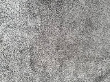 Soyut arkaplan. Monokrom dokusu. Görüntü siyah ve beyaz tonları içerir. Halı kumaş döşeme deseni yüzeyi. Tasarım dekorasyonu için iç malzemelerin yakın plan görüntüsü