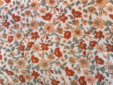 Hassas çiçek desenli kumaş, doku olarak yakın plan. Eski moda pamuk ya da keten kumaş. Renkli çiçek desenli retro tarzı. Parlak çiçek arkaplanı.