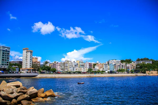 Stanley, Hong Kong 'un manzarası. Kırsal kesimde seyahat sahnesi, doğa manzarası ve şehir manzarası. 