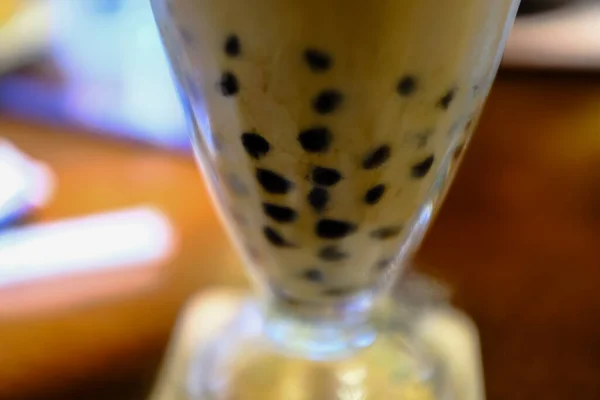 Close-up of the bubble milk tea. Taiwan famous drinks. The texture of the bubble milk tea. Food and drink concept.