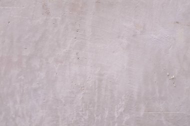 Düz duvara yakın çekim. Duvarın detayları, arka plan. Özet oluşturuluyor, duvar arkaplanı inşa ediliyor.