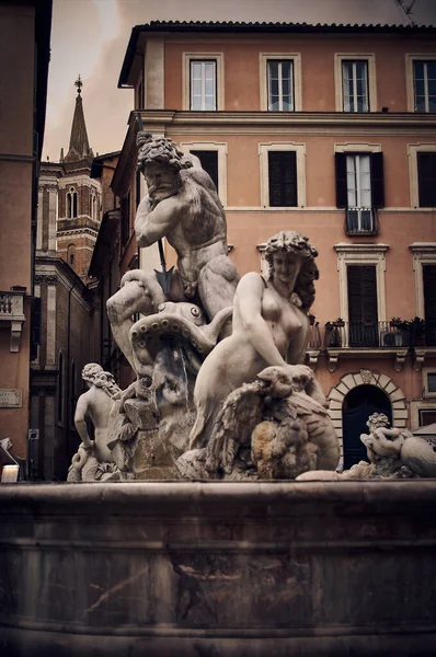 detail of the sculptures in the fountains of the Navona square in Rome