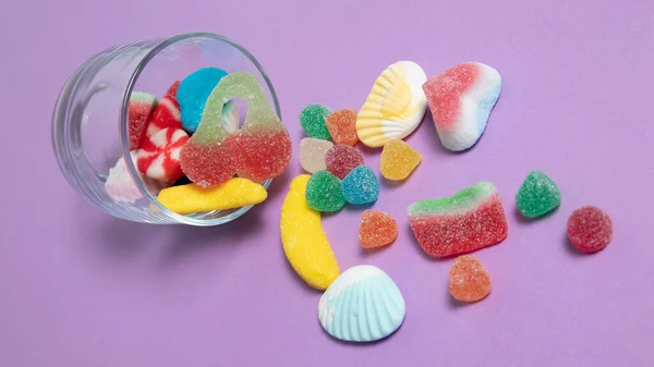 Colorful Candies Purple Background — 스톡 사진
