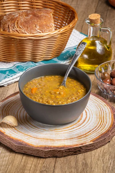 Fakes a traditional Greek vegetarian soup made from brown lentils