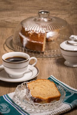 Homemade pound cake and cup of coffee