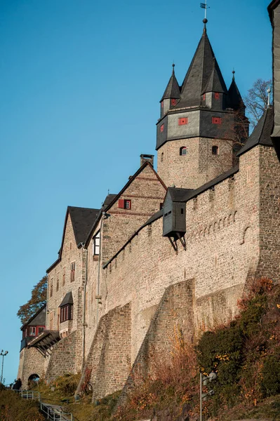 Altena Castle Burg Altena in Sauerland Germany is a famous Landmark monument in the Lenne Valley and Mediaval Sight with First Youth Hostel of the World on a sunny colorful autumn day