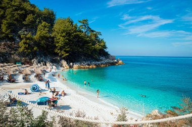 Marble Beach in Thassos Greece with turquoise water and the white sand clipart