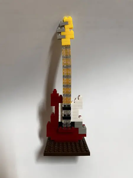 stock image Mini figures bricks guitar toy