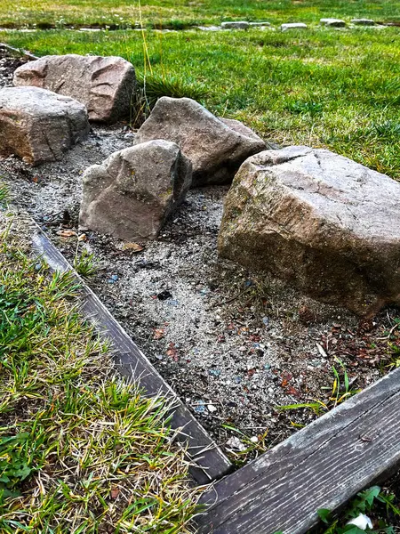 stock image Detail of broken stones in the yard. Large stone fragments in the frame.