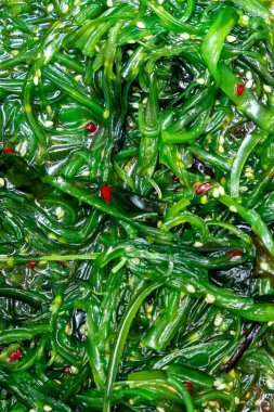 Deniz yosununun dokusu makro yeşili.