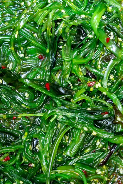 Deniz yosununun dokusu makro yeşili.