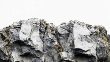 Beyaz zemin üzerinde pürüzlü pürüzlü kayalık bir uçurum.