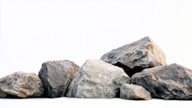 Kayalar yıpranmış taşlar beyaz arkaplanda tek başlarına duruyorlar..