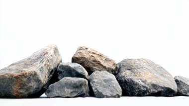 Kayalar yıpranmış taşlar beyaz arkaplanda tek başlarına duruyorlar..