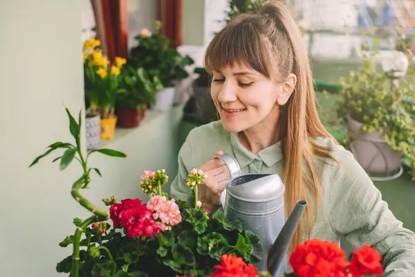 Happy Woman Gardener Watering Plants Sitting Table Terrace Garden Young — Foto de Stock