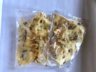 Peyek. Indonesian food still on wrapped 