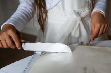 sweets, cake and cookies girl cutting a cake with sliver knife