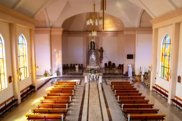 interiors and details in catholic church modern and simple catholic church interior view towards the altar from choir