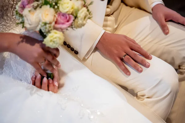 hands, wedding rings and marriage vows