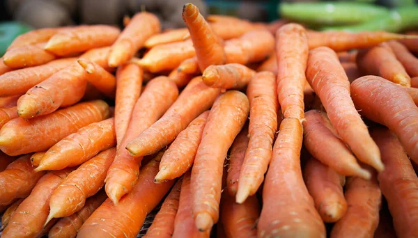 stock image lot of Carrots in local market. closeup. selective image.