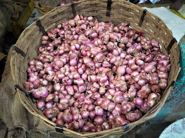 top view of huge small onions in basket. selective focus image.