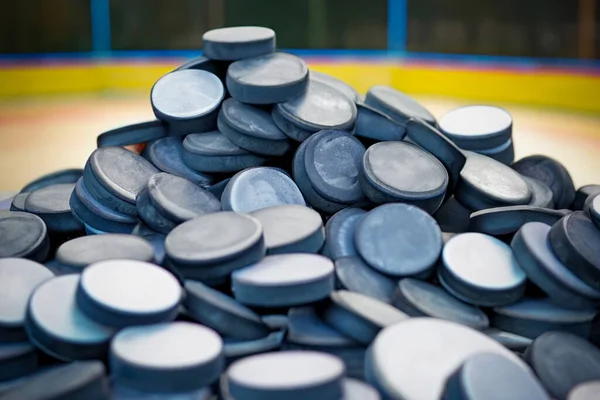 Huge Pile Real Hockey Pucks Blurred Playground Background Selective Focus — Stock Photo, Image