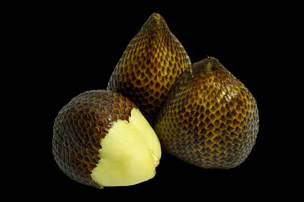 Exotic of Salak snake fruit isolated on black background with clipping path