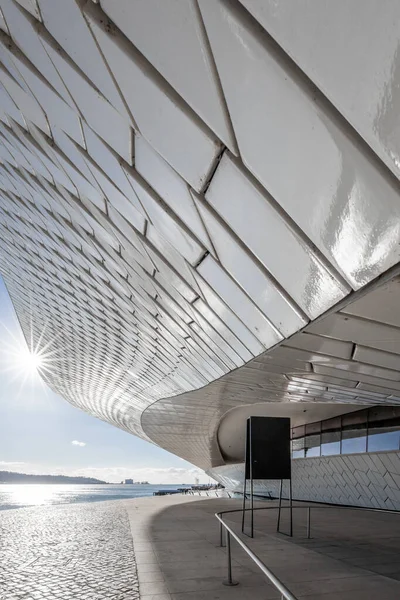 stock image MAAT  Museum of Art, Architecture and Technology. The Tagus River and 25 April Bridge on the background. Scooters parked.