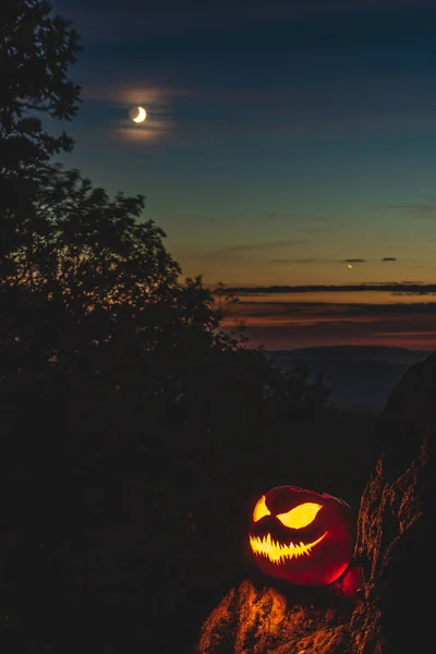Purge mask, halloween with pumpkin. LED mask, creepy scary man. Corona, Funny, October, outside. Urban scene