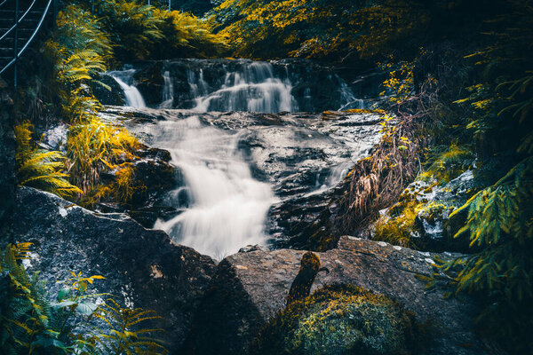 waterfall with bridge at Allerheiligen waterfall cascade in black forest, germany