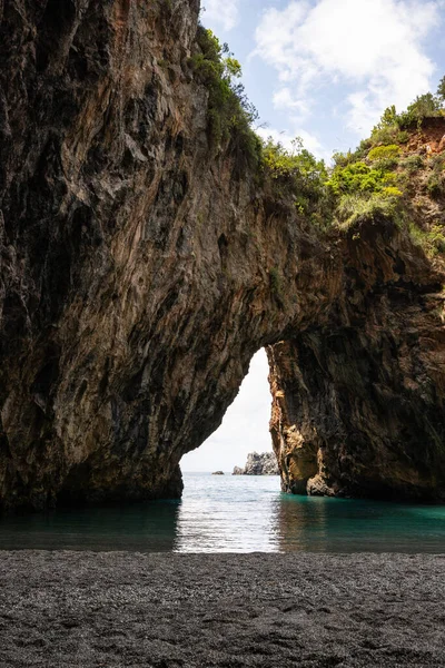 stock image Beautiful hidden beach. The Saraceno grotto is on the seafront Salerno, Campania, Salerno, Italy