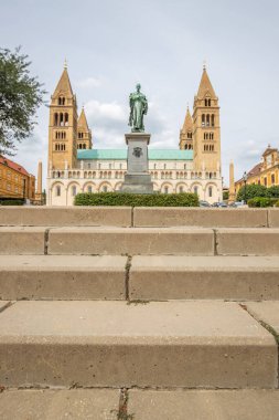 Basilica of a historic city center of the Five Churches City. Watching is that Cathedral of St. Peter and Paul in the historic old town of Pcs, Dl-Dunntl, Hungary clipart