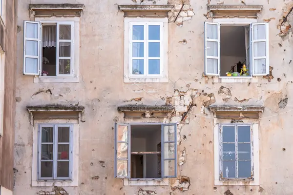 stock image Window of an old building showing bullet holes from the Balkan War. Window front or house front in the historic old town of Zadar, Adriatic Sea, Dalmatia, Croatia