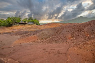 World famous place, a natural wonder in the middle of a park. Landscape shot at sunset in the rain. Seven Colored Earth, Black River Gorges National Park, Mauritius clipart