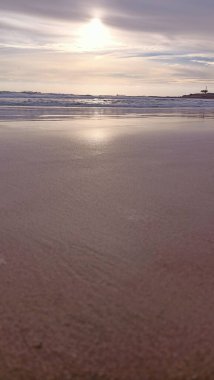 Beautiful sunset on the ocean near the city of Lisbon. High quality photo