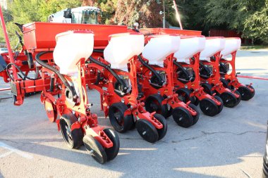 Advanced hightech seed planters are now ready to enhance the efficiency of agricultural planting and farming processes clipart