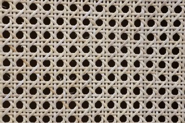 Bu yakın çekim çarpıcı, dairesel açıklıkları olan, tekstil veya tasarım için mükemmel, karmaşık bir desen sergiliyor.