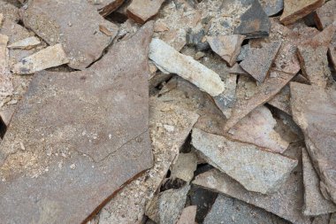 Çeşitli eşsiz doku ve renkleri gösteren farklı bir yapı malzemesi koleksiyonu.