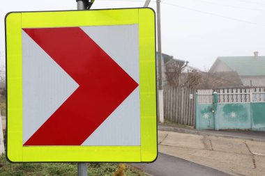 A clearly visible and informative traffic sign indicating a right turn, crucial for safe road navigation clipart