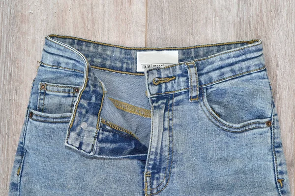 Ljust Färgade Jeans Ligger Golvet — Stockfoto
