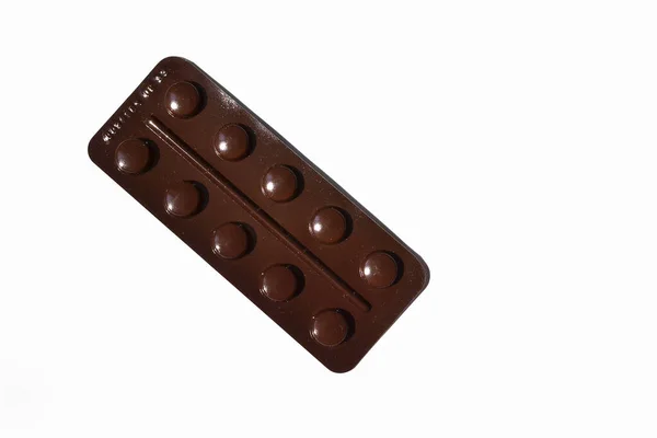 Egy Sötét Buborékcsomagolás Tabletták Fekszik Fehér Háttér — Stock Fotó