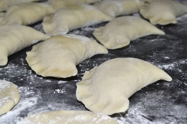 stock image there are many prepared dumplings on the table