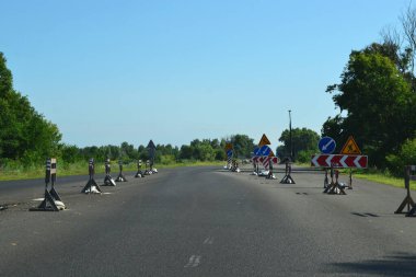 repair work is underway on the road