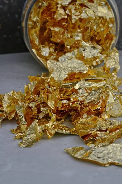 gold leaf for nails in a jar