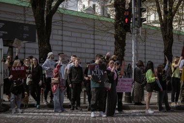Kyiv, Ukraine. On April 7, 2024, many caring people came out in the city center to remind everyone that the Azov military has been in russian captivity for two years. People are leaving in their cars and honking loudly with placards. clipart