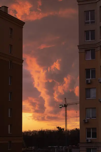 Kyiv, Ukraine. March 29, 2024. In the afternoon, the first thunderstorm of the year thundered. it was raining and there was lightning. then there was an incredible orange-red sunset