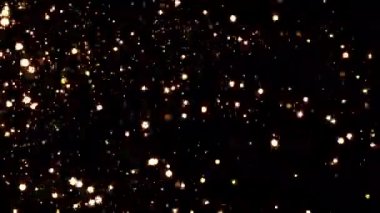 4k içinde alfa arkaplanda parlayan altın bokeh parçacıkları