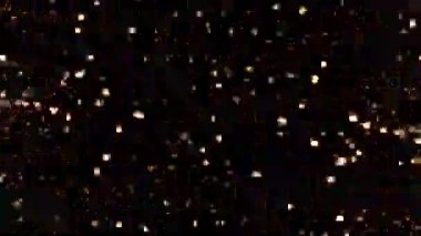 4k içinde alfa arkaplanda parlayan altın bokeh parçacıkları